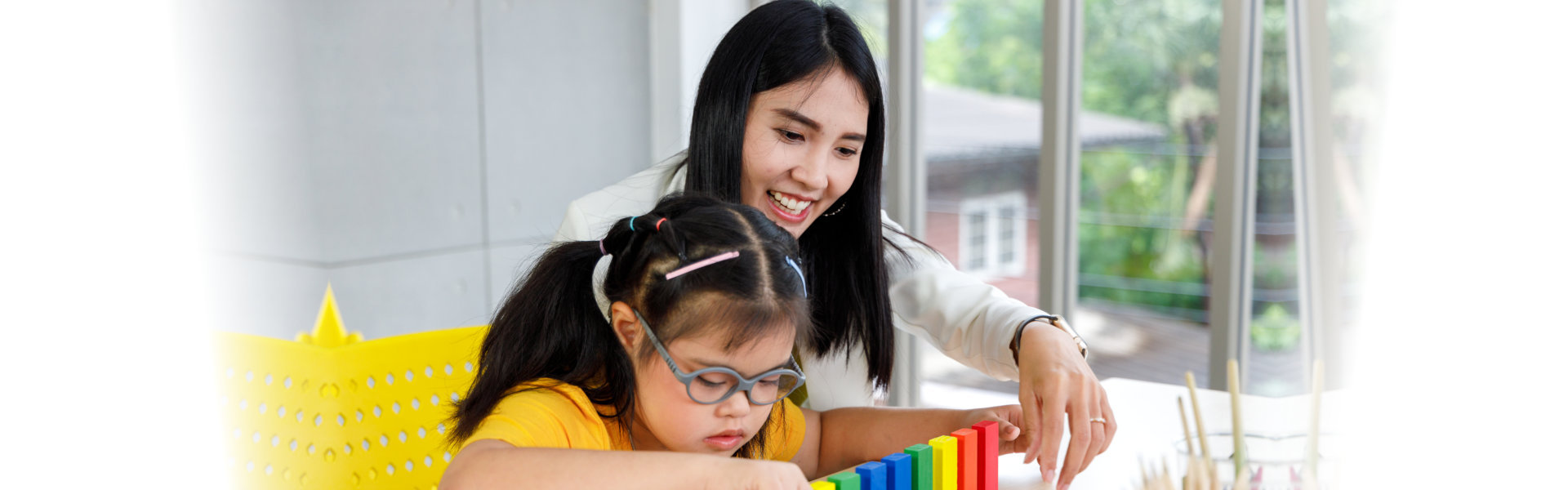 young woman and the little girl doing activity