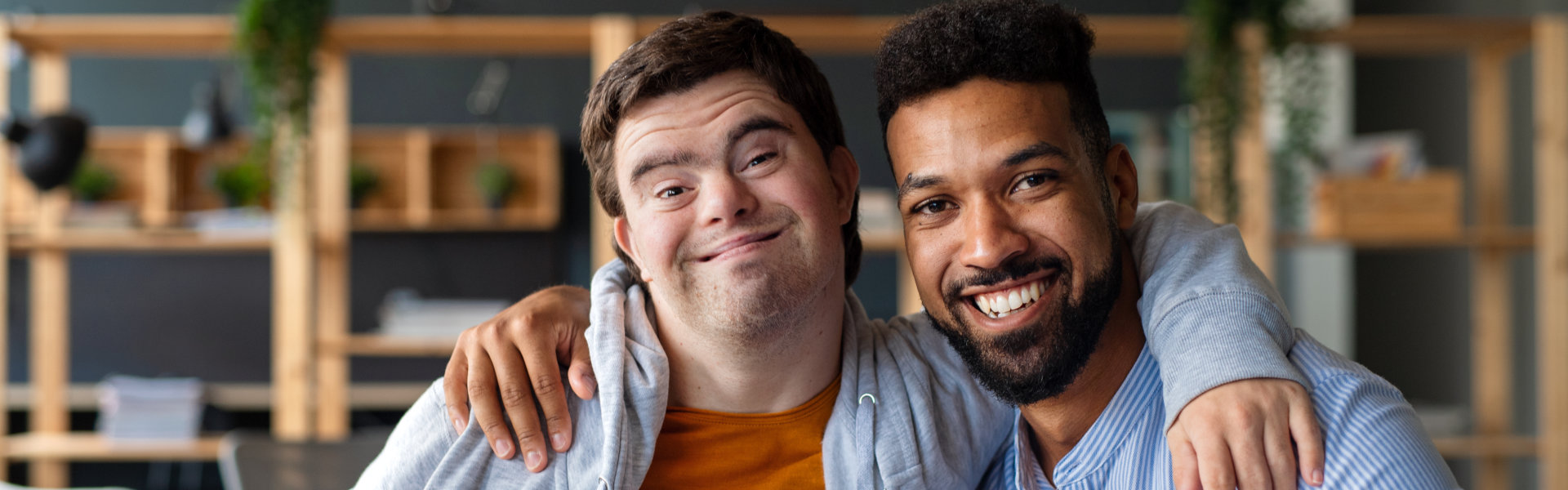 teenager and caregiver smiling